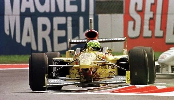JORDAN DRIVER GIANCARLO FISICHELLA QUALIFIES 3rd AT HIS HOME GRAND PRIX IN ITALY'97. PHOTO:LAT / ELFORD