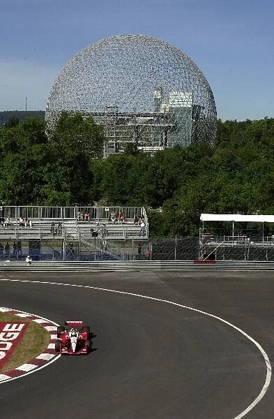 Kenny Brack goes through the hairpin during practice for the Molson Indy Montreal