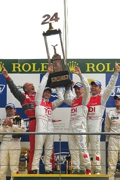 Le Mans 24 Hour Race: Race winners Rinaldo Capello  /  Allan McNish  /  Tom Kristensen, Audi Sport North America on the podium