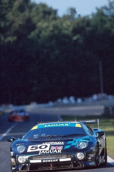 Le Mans 24 Hours: The Jaguar XJ220C of David Brabham, David Coulthard and John Nielsen won the GT1 class but was later disqualified on a technicality