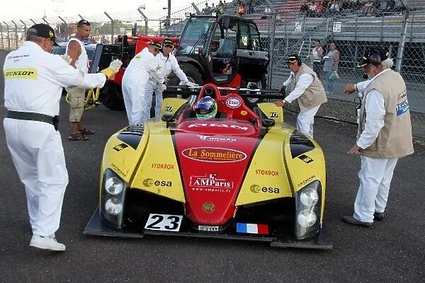 Le Mans 24 Hours: Jean-Bernard Bouvet  /  Sylvain Boulay  /  Bobby Julien Gerard Welter WR Peugeot is recovered by marshals after a spin