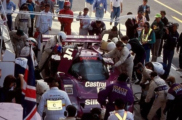 Le Mans 24 Hours: Kenny Acheson prepares to vacate the seat of the Jaguar XJR-12 for Teo Fabi