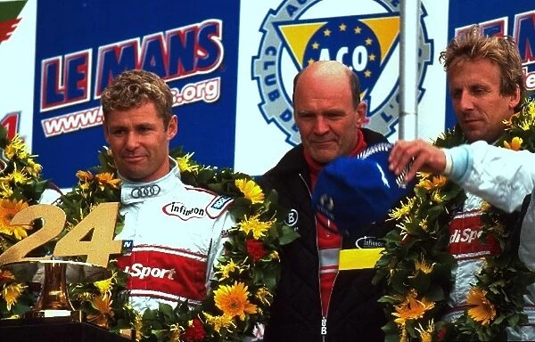 Le Mans 24 Hours: L-R: Tom Kristensen, Frank Biela winners of the 2001 Le Mans 24 Hours