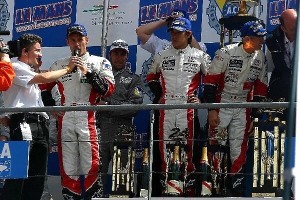 Le Mans 24 Hours: Tom Kristensen Audi Sport Japan Team Goh Audi R8 gives an interview on the podium