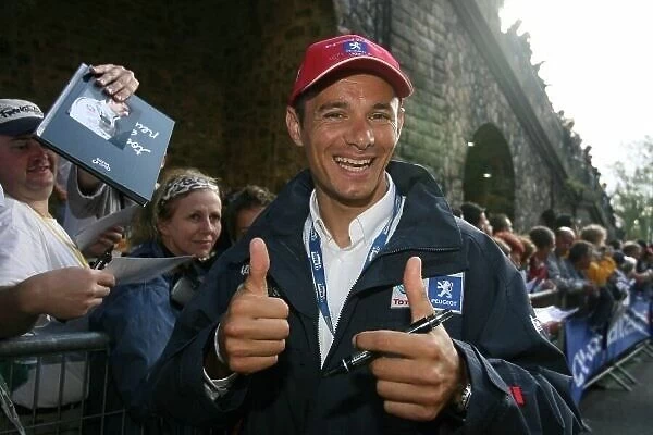 Le Mans. Stefan Sarrizan (FRA) Peugeot pole winner at the drivers parade.