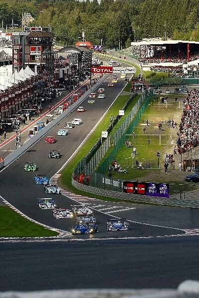 Le Mans Endurance Series: Nicolas Minassian Creation Autosportif DBA4 03S Zytek leads the field out of Eau Rouge at the start