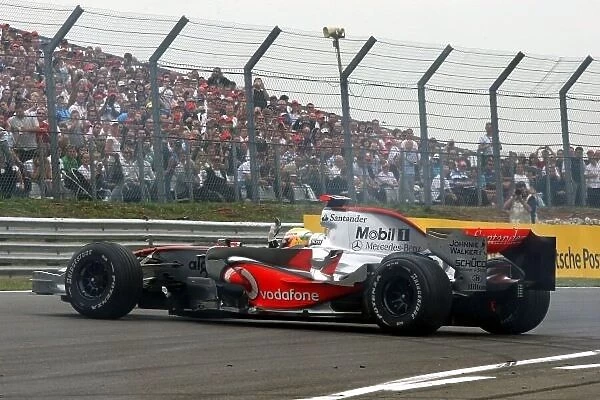 DTM. Lewis Hamilton (GBR) does doughnuts for the crowd in a McLaren F1 car.
