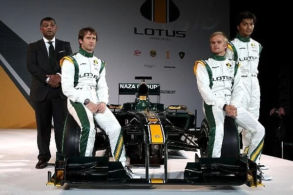 Lotus T127 Launch: The new Lotus T127 with Tony Fernandes, Heikki Kovalainen, Fairuz Fauzy Lotus F1 Racing test driver and Jarno Trulli Lotus