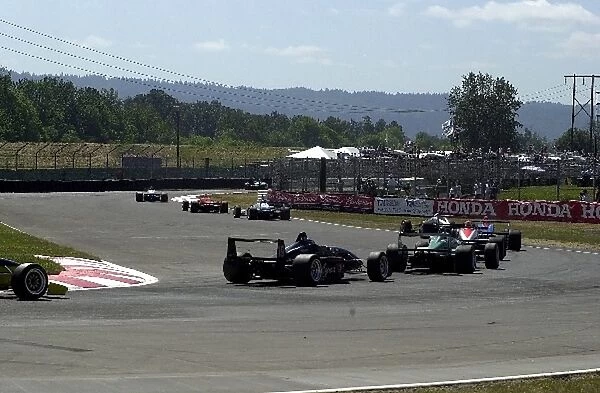 Luis Diaz leads the field out of the Festival chicane on the second lap of the Portland Toyota Atlantic