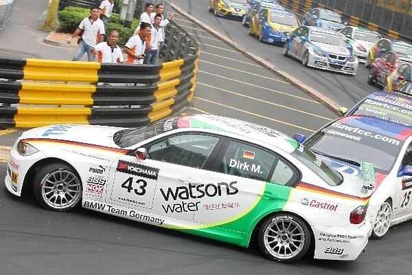 Macau WTCC: Dirk Muller BMW is pushed into a spin by Fabrizio Giovanardi JAS Motorsport