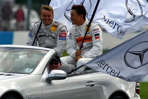 DTM. Marcel Fassler (SUI) AMG-Mercedes and Katsutomo Kaneishi (JPN) ARTA AMG-Mercedes.