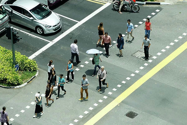 Marina Bay Circuit, Singapore. 18th September 2013. Singaporeans cross the street. World Copyright: Jed Leicester / LAT Photographic. ref: Digital Image _JEL9033