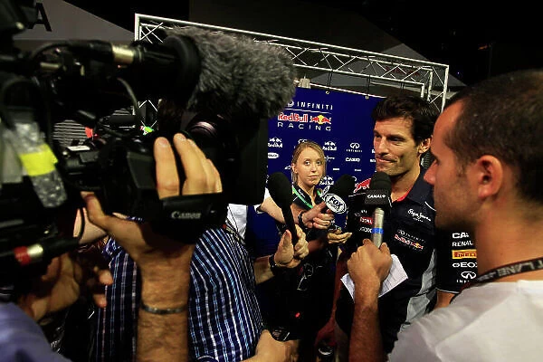 Marina Bay Circuit, Singapore. 19th September 2013. Mark Webber, Red Bull Racing, talks to the media. World Copyright: Charles Coates / LAT Photographic. ref: Digital Image _X5J8546
