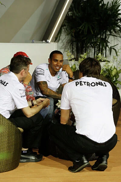Marina Bay Circuit, Singapore. Friday 20th September 2013. Lewis Hamilton, Mercedes AMG in conversation with Niki Lauda, Non-Executive Chairman, Mercedes AMG, Toto Wolff, Executive Director, Mercedes AMG and Paddy Lowe