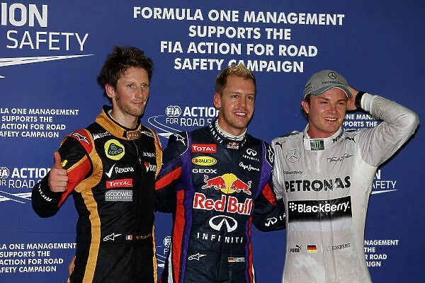 Marina Bay Circuit, Singapore. Saturday 21st September 2013. Top three qualifiers, Sebastian Vettel, Red Bull Racing, Nico Rosberg, Mercedes AMG and Romain Grosjean, Lotus F1