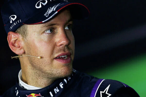 Marina Bay Circuit, Singapore. Saturday 21st September 2013. Sebastian Vettel, Red Bull Racing, in the press conference after qualifying. World Copyright: Charles Coates / LAT Photographic. ref: Digital Image _N7T5394