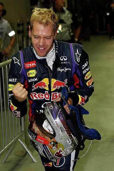 Marina Bay Circuit, Singapore. Saturday 21st September 2013. Sebastian Vettel, Red Bull Racing, celebrates getting pole position. World Copyright: Charles Coates / LAT Photographic. ref: Digital Image _N7T5227