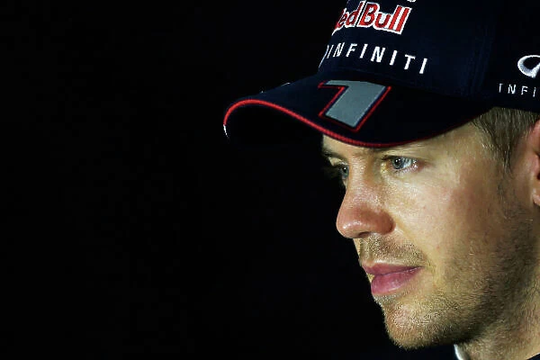 Marina Bay Circuit, Singapore. Saturday 21st September 2013. Sebastian Vettel, Red Bull Racing, in the press conference after qualifying. World Copyright: Charles Coates / LAT Photographic. ref: Digital Image _N7T5435