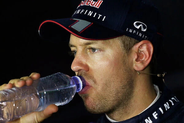 Marina Bay Circuit, Singapore. Saturday 21st September 2013. Sebastian Vettel, Red Bull Racing, in the press conference after qualifying. World Copyright: Charles Coates / LAT Photographic. ref: Digital Image _N7T5399