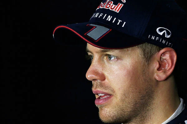 Marina Bay Circuit, Singapore. Saturday 21st September 2013. Sebastian Vettel, Red Bull Racing, in the press conference after qualifying. World Copyright: Charles Coates / LAT Photographic. ref: Digital Image _N7T5446