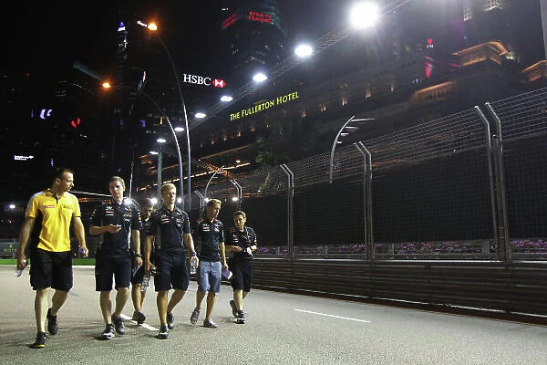 Marina Bay Circuit, Singapore. Thursday 19th September 2013. Sebastian Vettel, Red Bull Racing walks the track with his team. World Copyright: Andy Hone / LAT Photographic. ref: Digital Image HONY9123