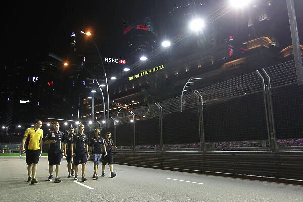 Marina Bay Circuit, Singapore. Thursday 19th September 2013. Sebastian Vettel, Red Bull Racing walks the track with his team. World Copyright: Andy Hone / LAT Photographic. ref: Digital Image HONY9120