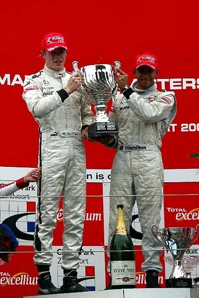 Marlboro Masters of Formula 3: Paul di Resta Manor Motorsport and race winner Lewis Hamilton ASM F3 Dallara celebrate the UK winning the nations