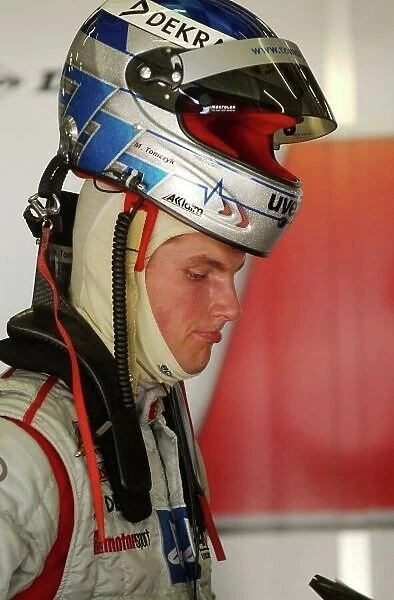 Martin Tomczyk (GER),s line Audi Junior Team, Portrait, with the HANS device and the helemt on top of his head. DTM Championship, Rd 7, Nrburgring, Germany. 15 August 2003. DIGITAL IMAGE