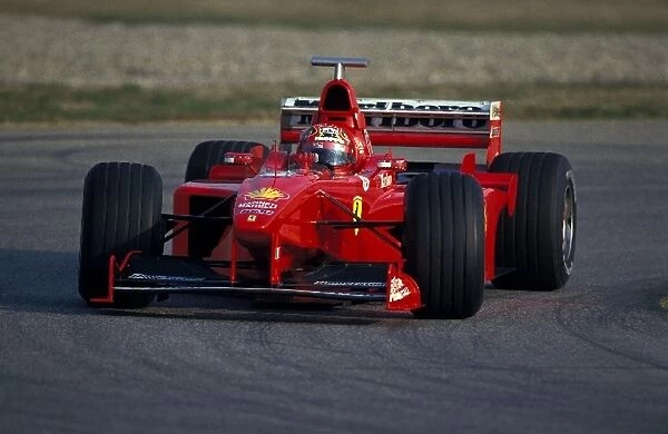 Max Biaggi Tests for Ferrari: Motorcycle racer Max Biaggi tests the 1998 Ferrari F300 F1 car