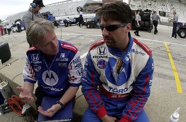 Michael Andretti talks to his engineer prior to practice for the Miller Lite 250. The Milwaukee Mile, Milwaukee, Wi. 31 May, 2002