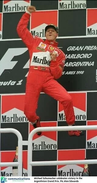 SE 4. Michael Schumacher celebrates victory in the Argentinian Grand Prix