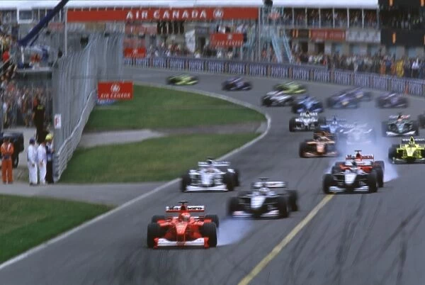 Michael Schumacher, Ferrari leads at the start: CANADIAN GRAND PRIX 2000
