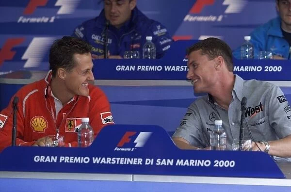 Michael Schumacher jokes with David Coulthard