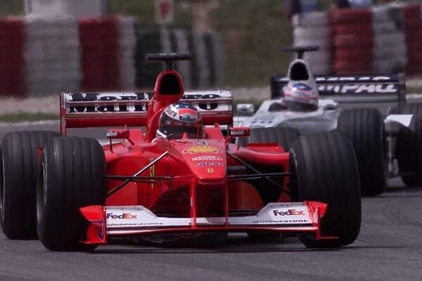 Michael Schumacher leads Jenson Button