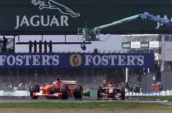 Micheal Schumacher leads Jos Verstappen