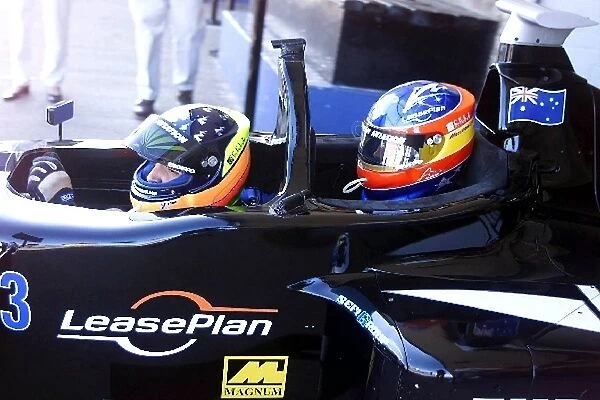Minardi 2 Seater Celebrity Day: Tarso Marques takes team mate Fernando Alonso for a ride in the 2 seater