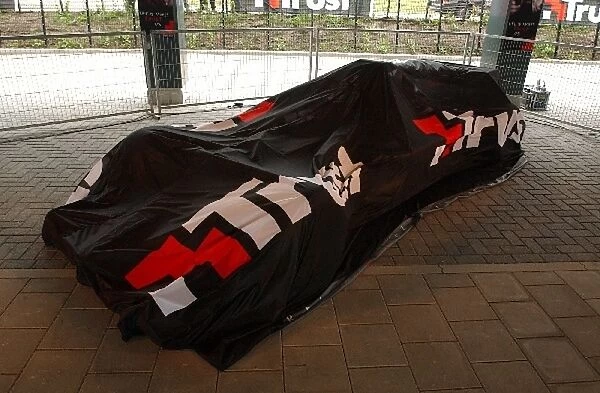 The Minardi Cosworth PS01 under covers before the presentation