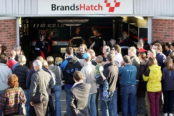 Minardi F1X2: Crowds gather outside the Minardi F1X2 pit garage