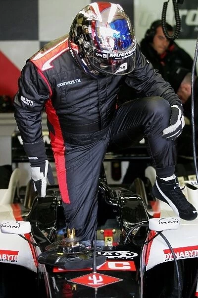 Minardi Testing: Paul Stoddart climbs into the Minardi
