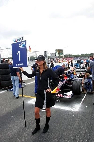 GP2. Mobil grid girl for Scott Speed (USA) iSport International on the grid.