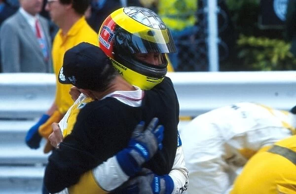 Monaco Formula Three: Ralf Schumacher receives a hug from his brother Michael after finishing second