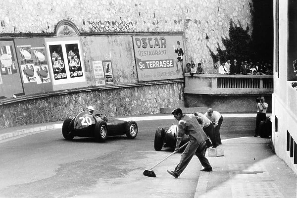 Monte Carlo, Monaco. 10 May 1959: Ron Flockhart, #20 BRM P25, retired, passes Harry Schell, BRM P25, retired, action