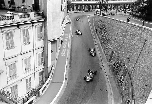 Monte Carlo, Monaco. 11-14 May 1961: Maurice Trintignant leads Phil Hill, Jo Bonnier, Wolfgang von Trips and Richie Ginther out of the Old Station