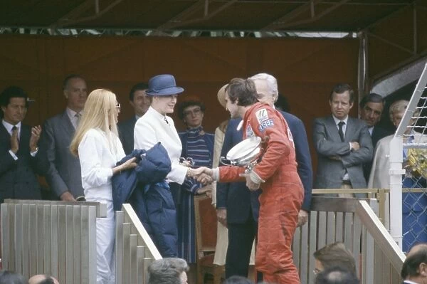 Monte Carlo, Monaco. 16-18 May 1980: Carlos Reutemann, 1st position, on the podium with Prince Rainier and Princess Grace