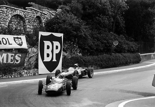 Monte Carlo, Monaco. 31 May-3 June 1962: Jack Brabham leads Phil Hill into the Old Station Hairpin. Hill finished in 2nd position
