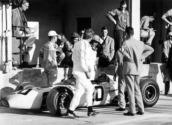 Monza, Italy. 12 September 1965: Richie Ginther, Honda RA272, 14th position, in the pits