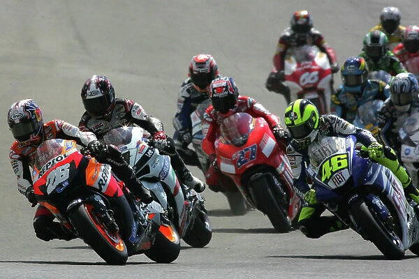 MotoGP. The start of the race lead by Dani Pedrosa (ESP) Repsol Honda.