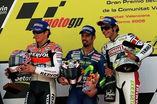 MotoGP. The podium (L to R): Nicky Hayden (USA) Repsol Honda Team, second; Marco Melandri 