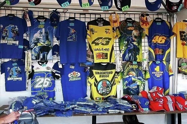 MotoGP. Valentino Rossi (ITA) Gauloises Team Yamaha merchandise stall.