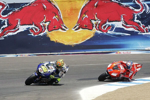 MotoGP. Race winner Valentino Rossi (ITA), FIAT Yamaha YZR-M1, leads Casey Stoner 